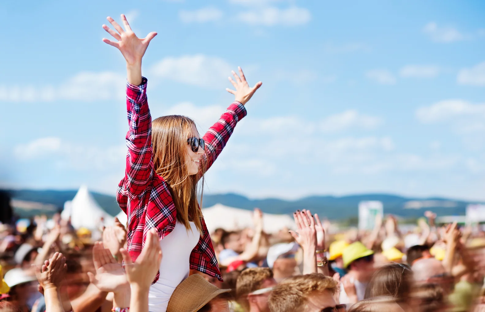 Disability support worker helping participant at community event in Melbourne